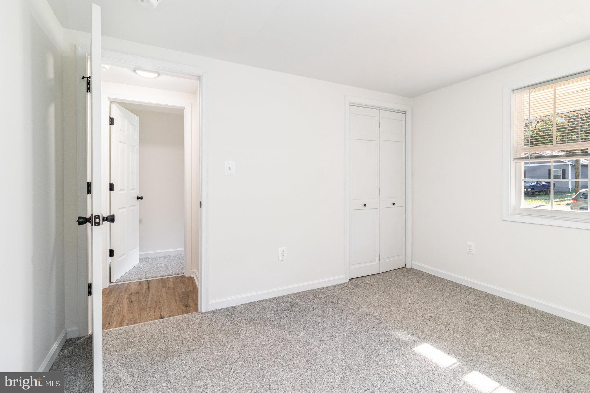 369 Circle Lane Colonial Beach, VA 22443 - Photo 12 of 18 a big room with closet and windows