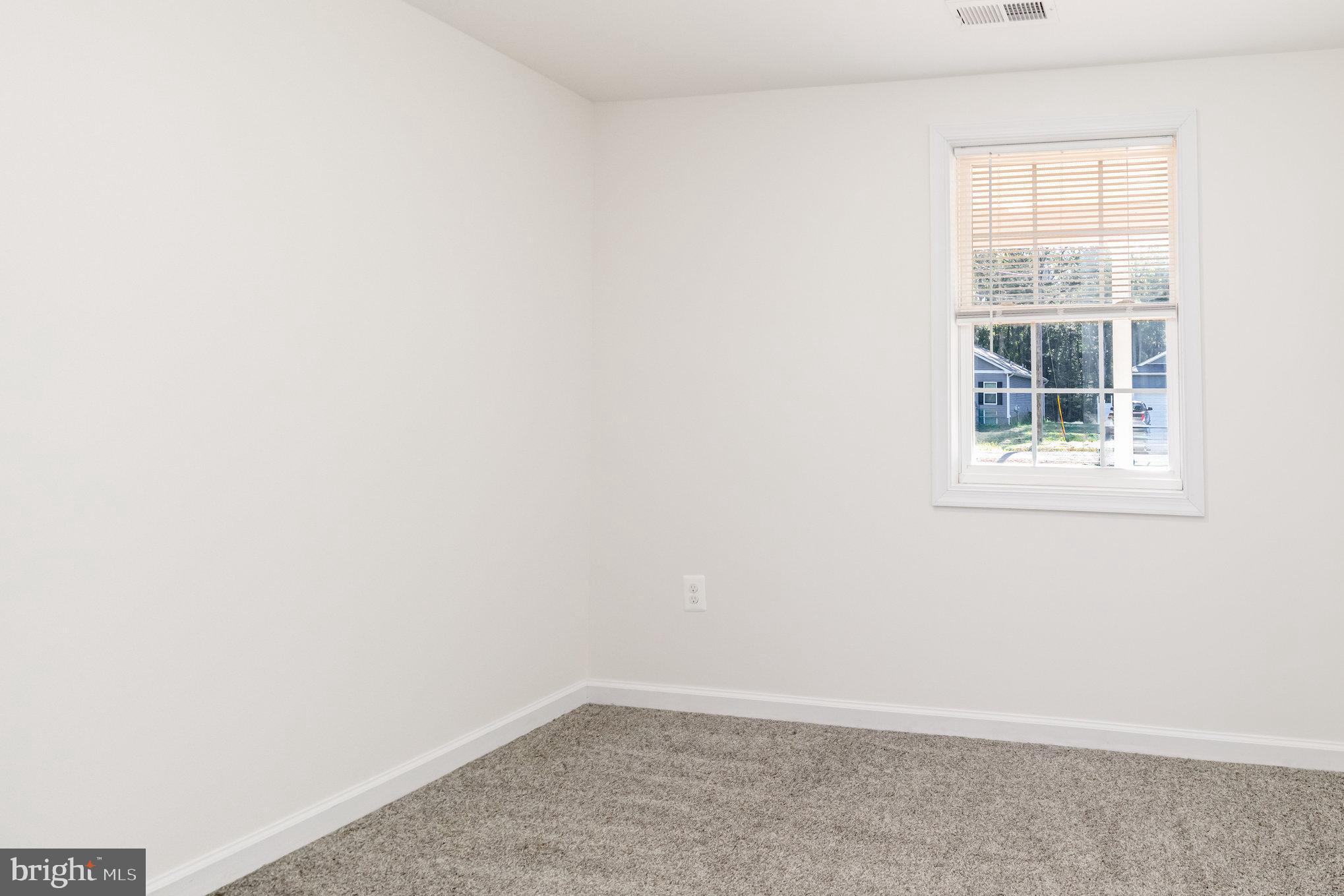 369 Circle Lane Colonial Beach, VA 22443 - Photo 14 of 18 an empty room with a window