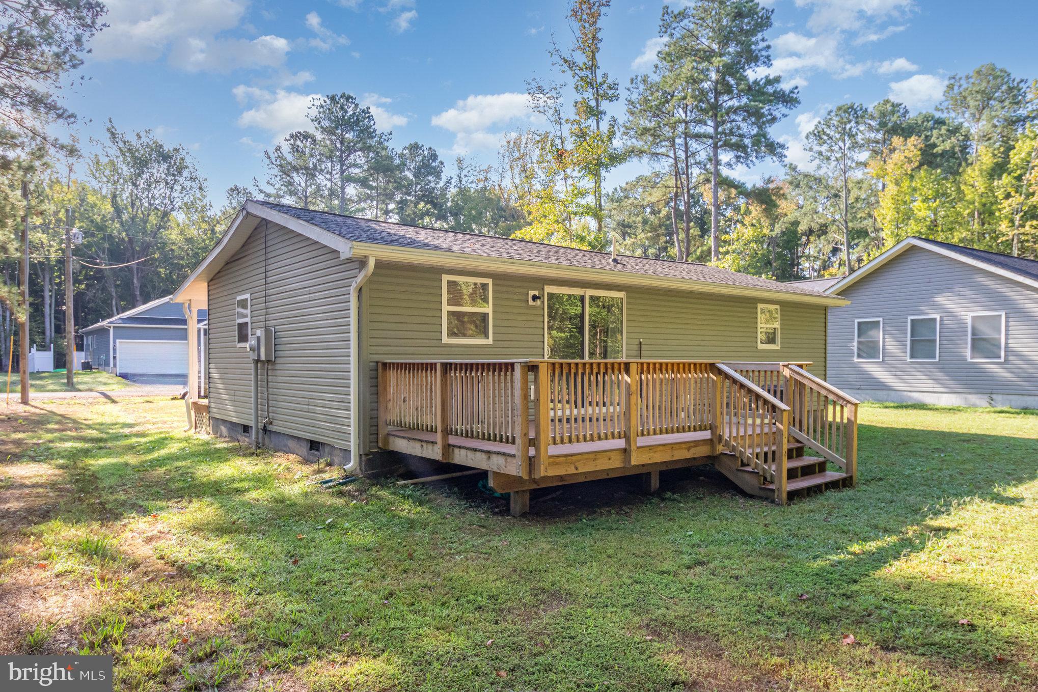 369 Circle Lane Colonial Beach, VA 22443 - Photo 17 of 18 a view of a house with a yard