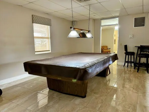 a view of a dining room with furniture