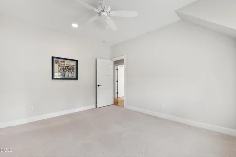 a picture of a tree in a backyard of a house