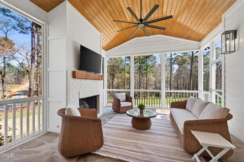 a view of livingroom with furniture wooden floor and window