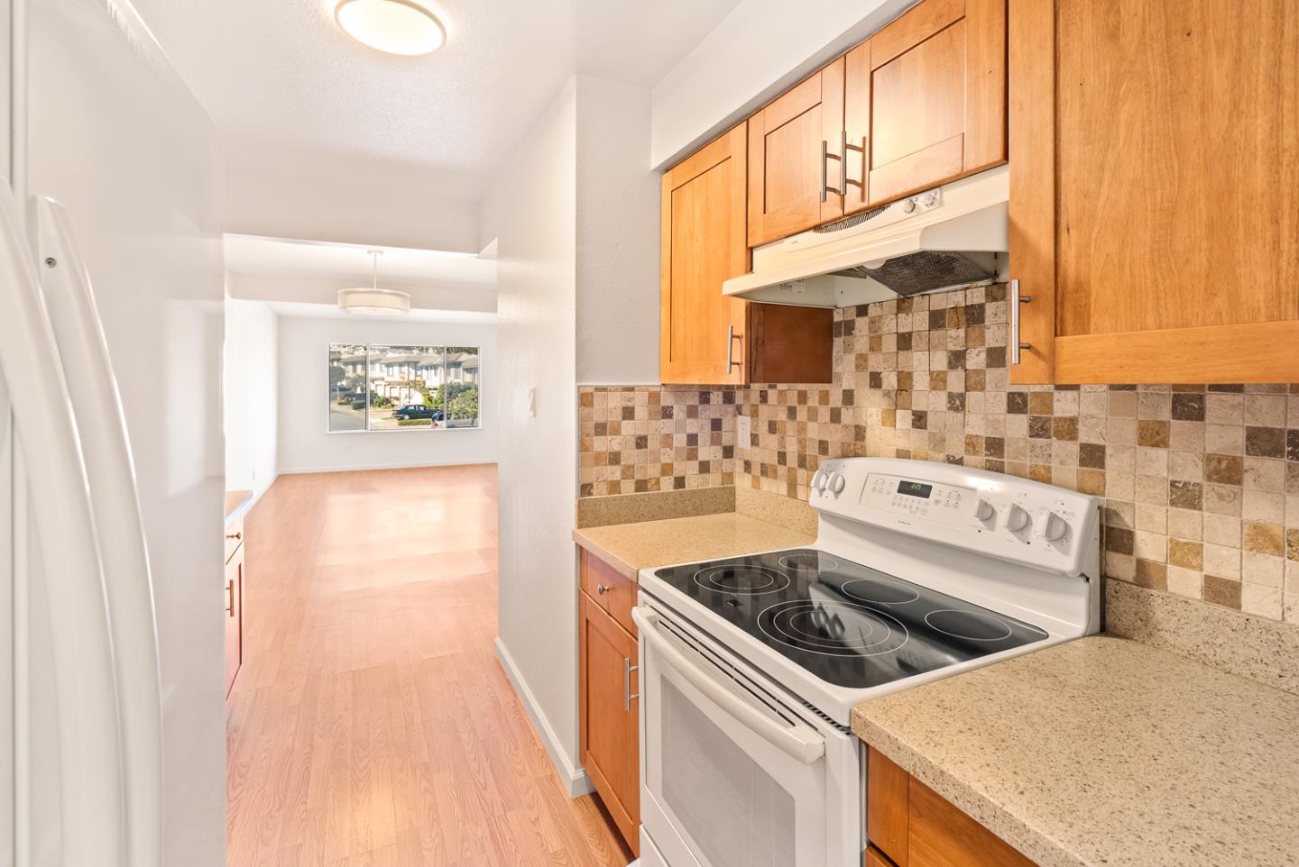 2419 Rowntree Way South San Francisco, CA 94080 - Photo 8 of 28 a kitchen that has a stove and a microwave