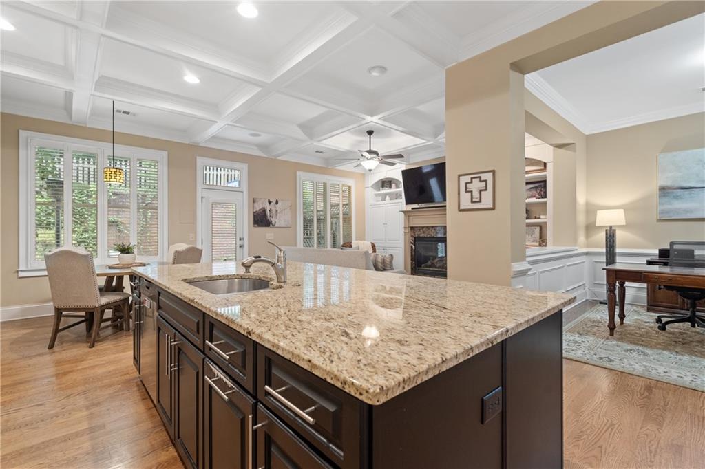 10567 Bent Tree View Duluth, GA 30097 - Photo 14 of 42 a kitchen with center island table and chairs