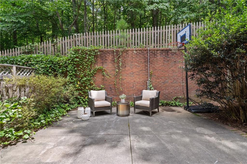 10567 Bent Tree View Duluth, GA 30097 - Photo 38 of 42 a view of a bench in back yard of the house