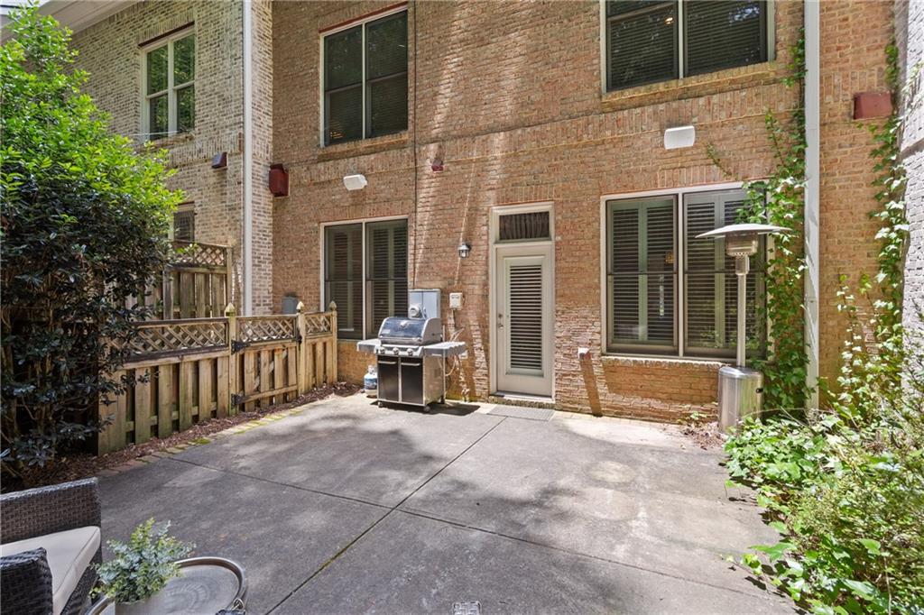 10567 Bent Tree View Duluth, GA 30097 - Photo 39 of 42 a view of a house with outdoor seating area