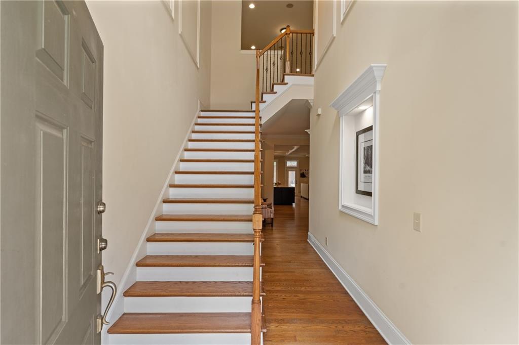 10567 Bent Tree View Duluth, GA 30097 - Photo 4 of 42 a view of entryway and hall with wooden floor