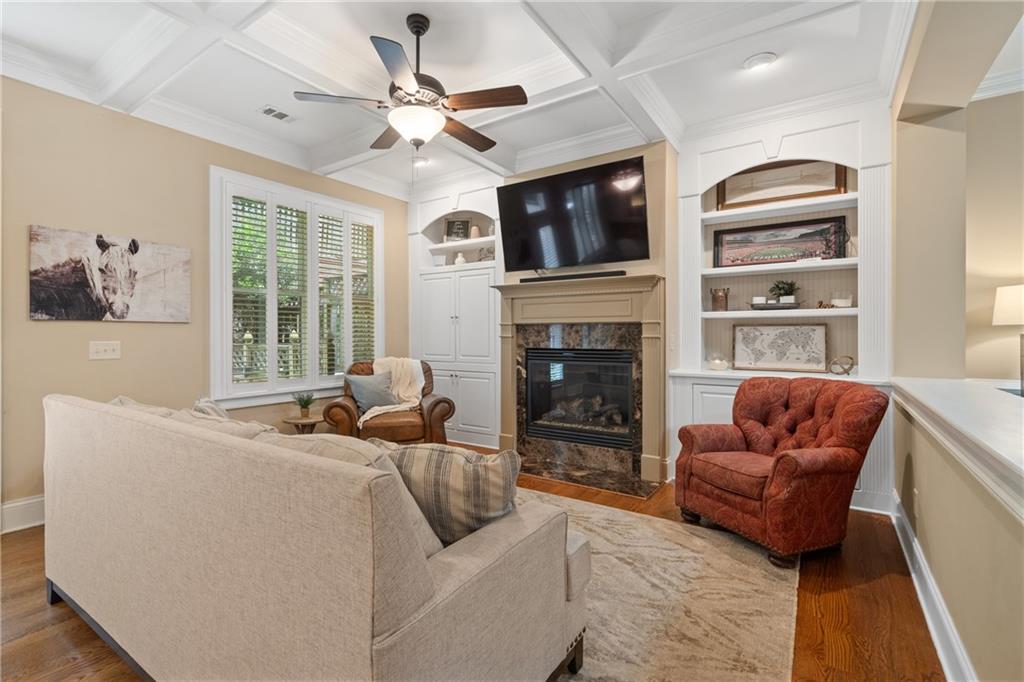 10567 Bent Tree View Duluth, GA 30097 - Photo 9 of 42 a living room with furniture fireplace and flat screen tv