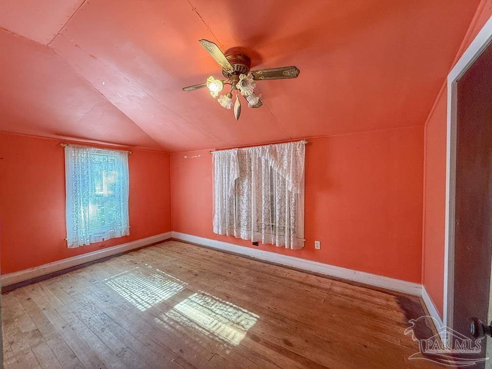 4550 Church Street Bagdad, FL 32583 - Photo 13 of 23 a view of a livingroom with a staircase