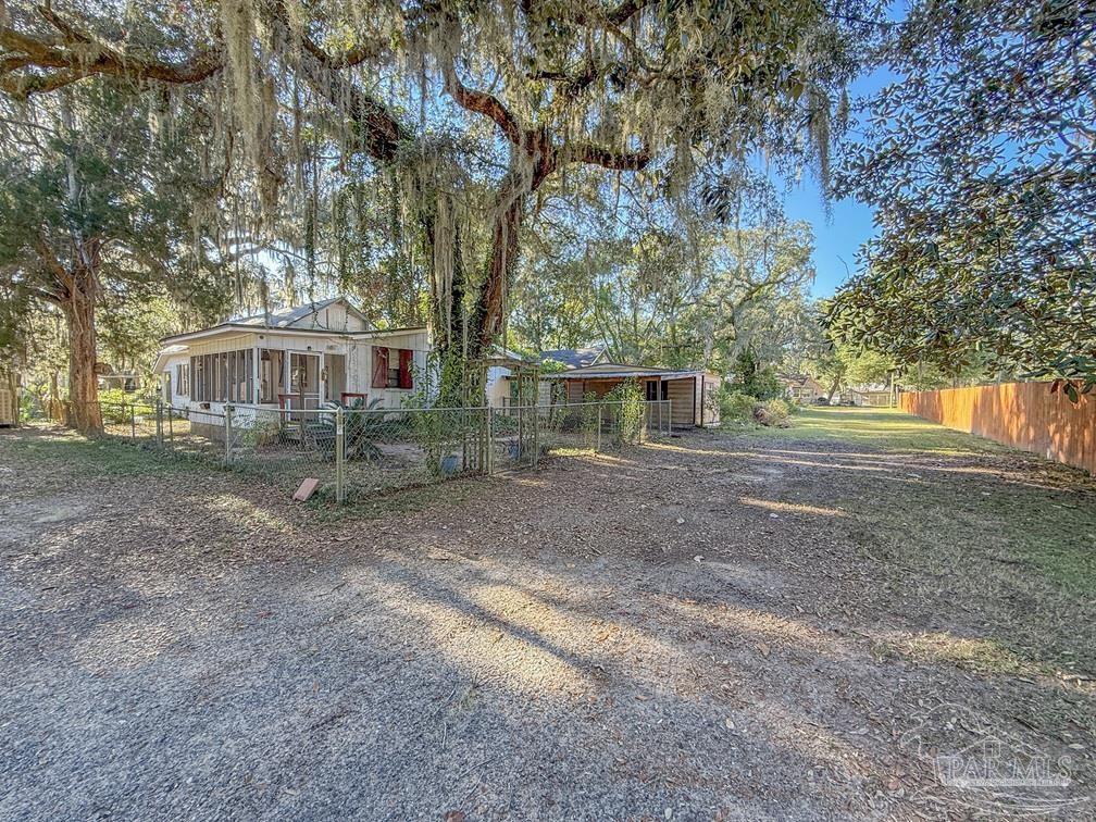 4550 Church Street Bagdad, FL 32583 - Photo 19 of 23 a view of house with outdoor space and street view