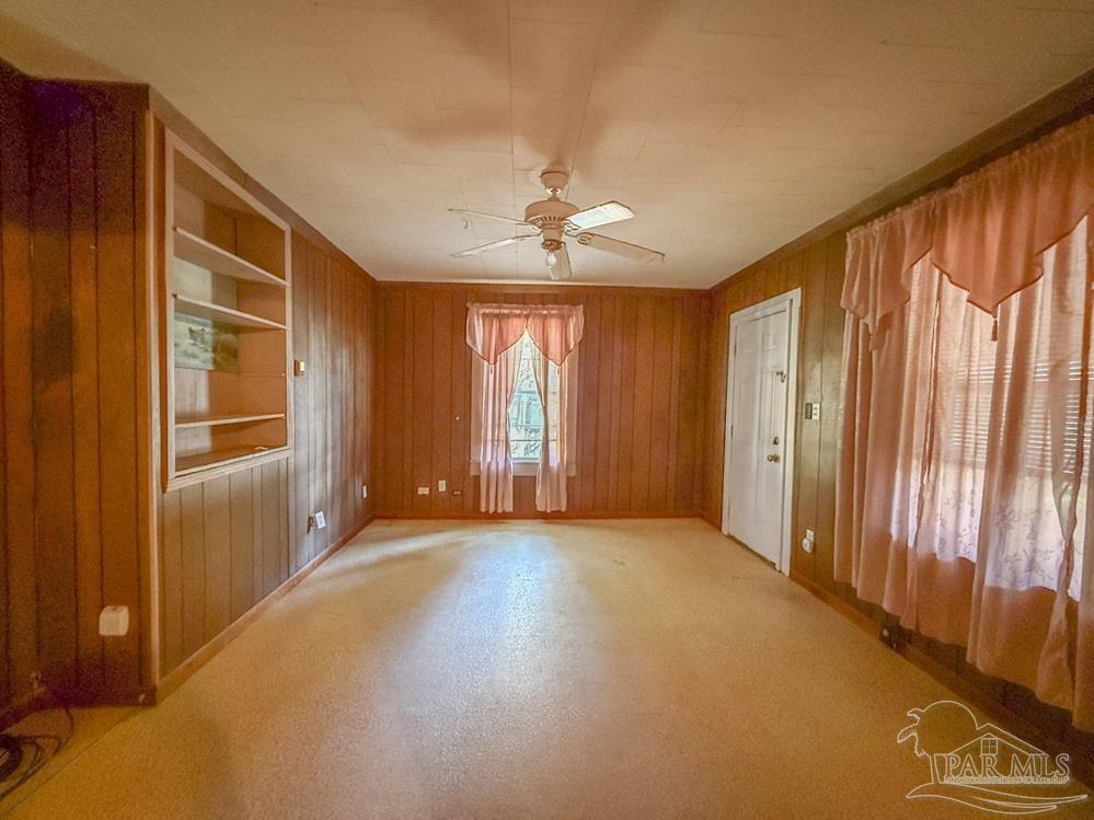 4550 Church Street Bagdad, FL 32583 - Photo 10 of 23 a view of an empty room with a window