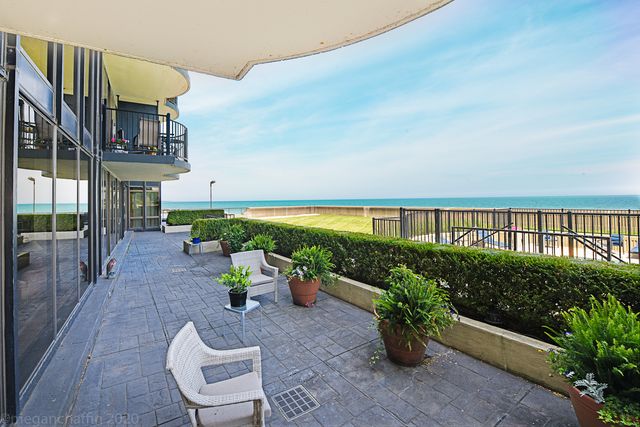 a view of a lake with a big yard