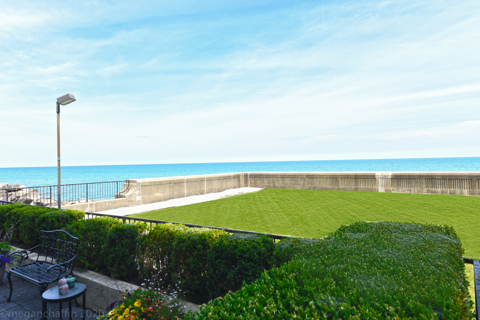 1420 Sheridan Road, Unit 1E Wilmette, IL 60091 - Photo 13 of 47 a view of a lake with a big yard