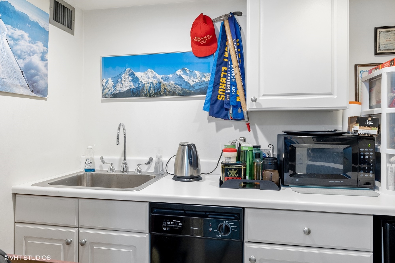 1420 Sheridan Road, Unit 1E Wilmette, IL 60091 - Photo 39 of 47 a kitchen with sink and cabinets