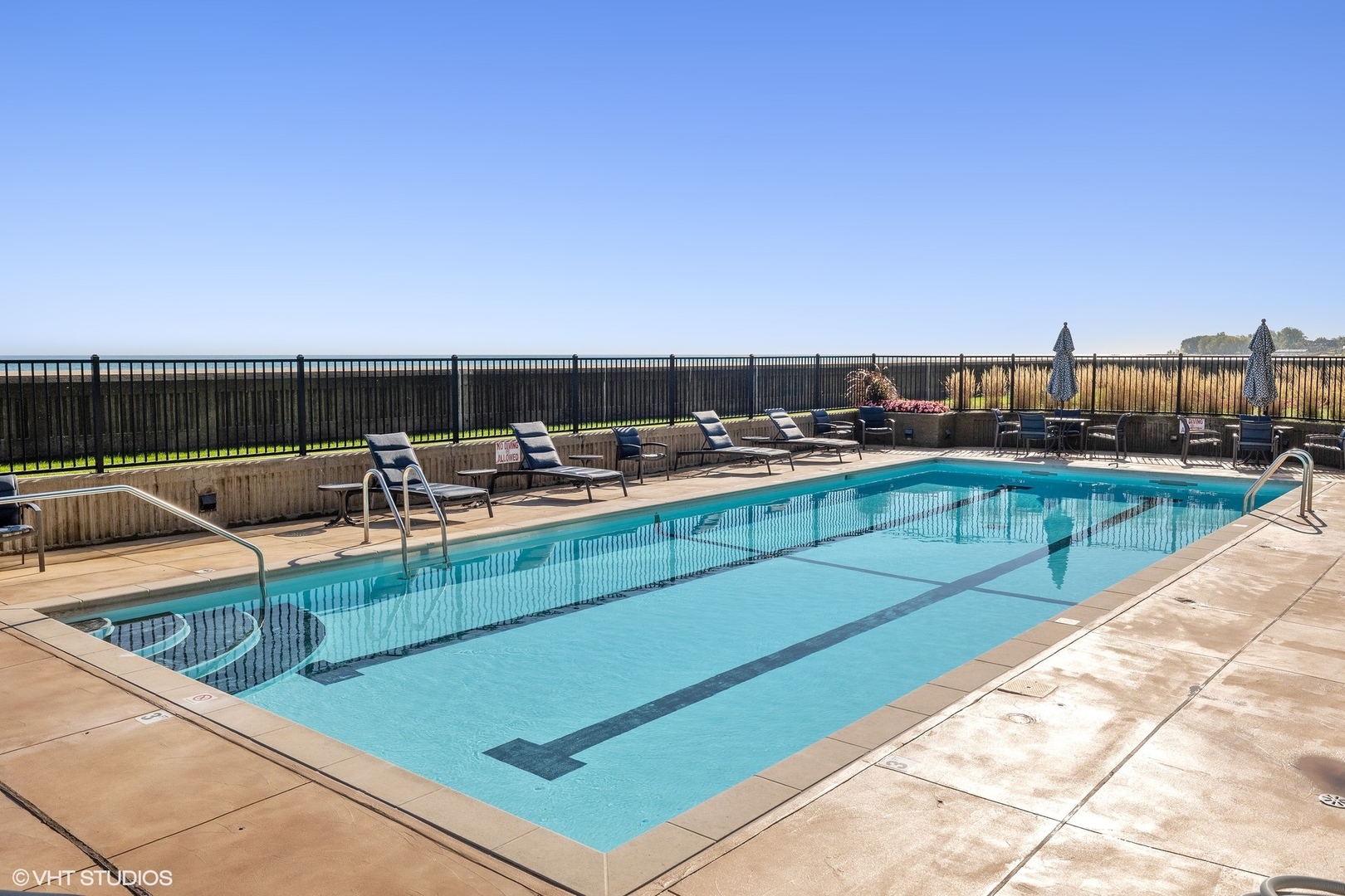 1420 Sheridan Road, Unit 1E Wilmette, IL 60091 - Photo 43 of 47 a view of a swimming pool with outdoor seating