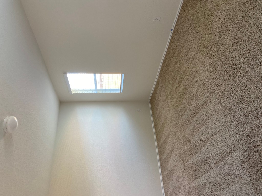 3607 Conyers Lane Austin, TX 78725 - Photo 15 of 24 an empty room with a window