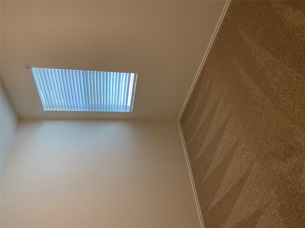 3607 Conyers Lane Austin, TX 78725 - Photo 17 of 24 an empty room with a window