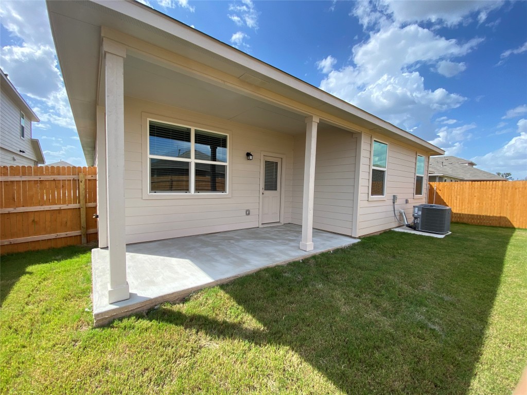 3607 Conyers Lane Austin, TX 78725 - Photo 23 of 24 a view of house with backyard