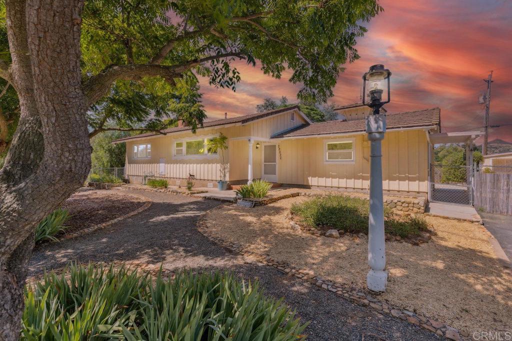 29826 Anthony Road Valley Center, CA 92082 - Photo 1 of 1 a front view of a house with garden