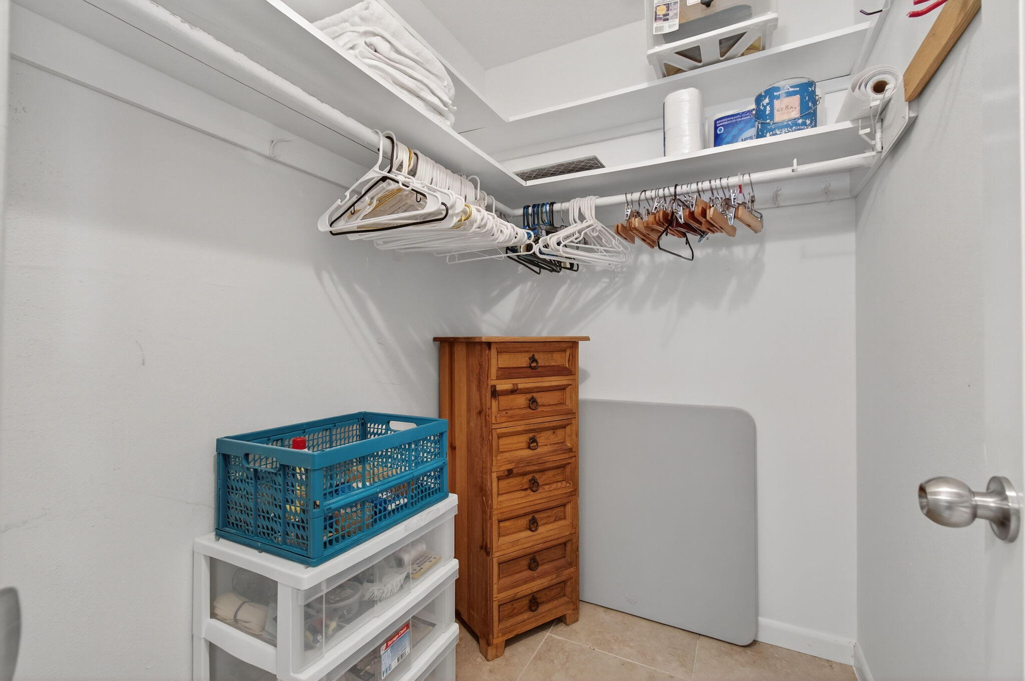 300 High Point Boulevard, Unit A Delray Beach, FL 33445 - Photo 26 of 37 a view of walk in closet with clothes