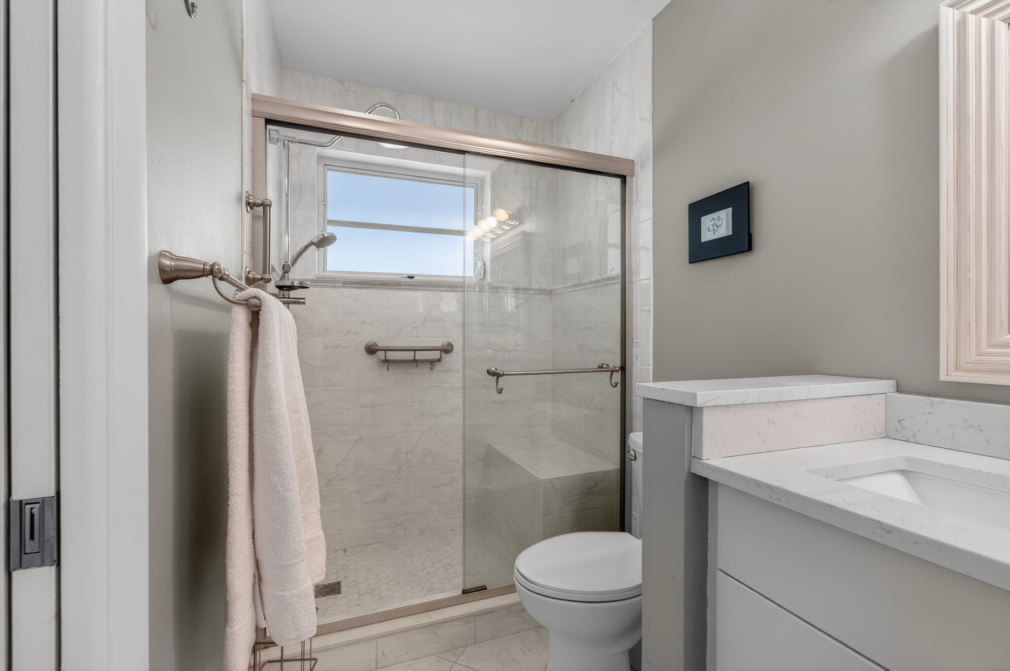 300 High Point Boulevard, Unit A Delray Beach, FL 33445 - Photo 28 of 37 a bathroom with a toilet and a shower
