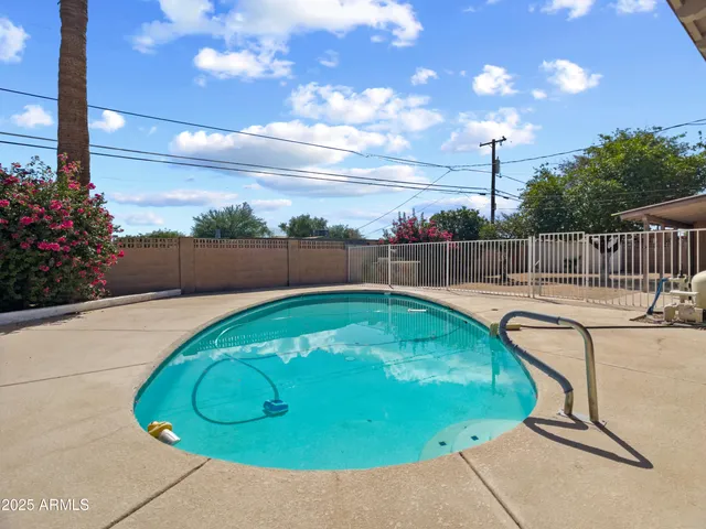 a view of a house with a swimming pool