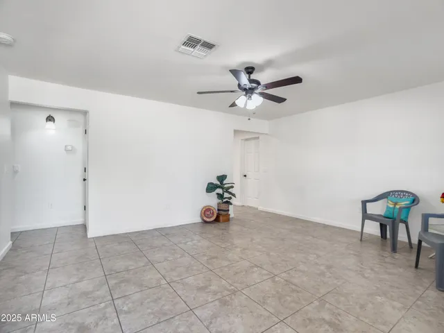 a view of a livingroom with furniture