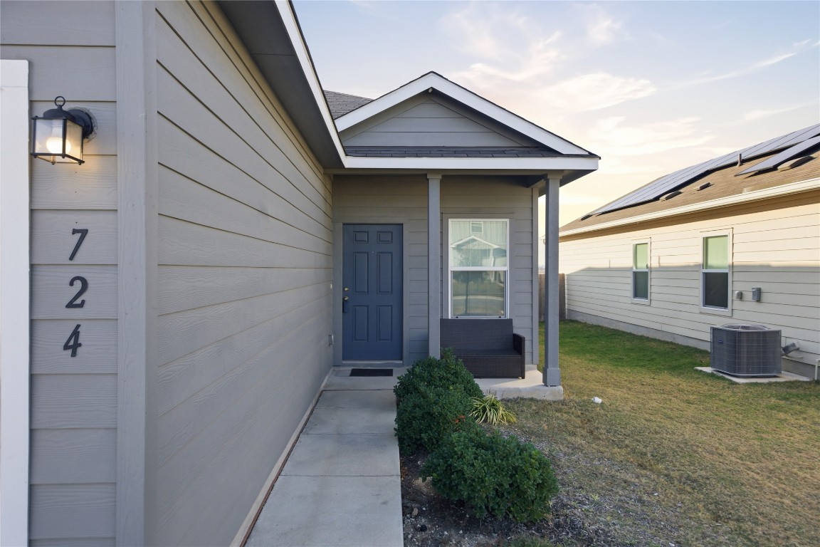 724 Rancho Del Cielo Loop Jarrell, TX 76537 - Photo 27 of 34 a view of a backyard with plants