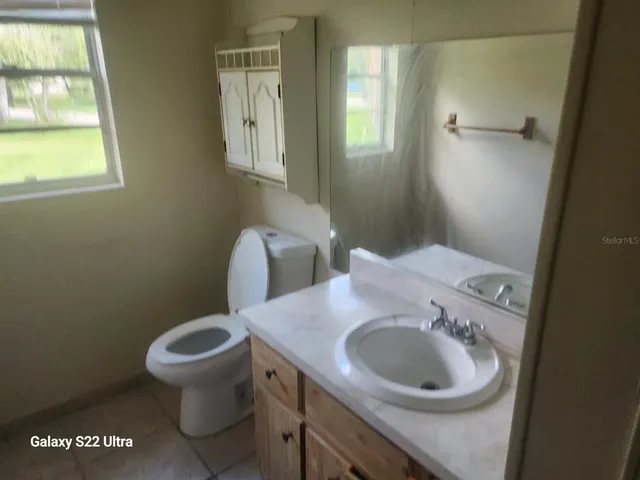 a bathroom with a bathtub and toilet