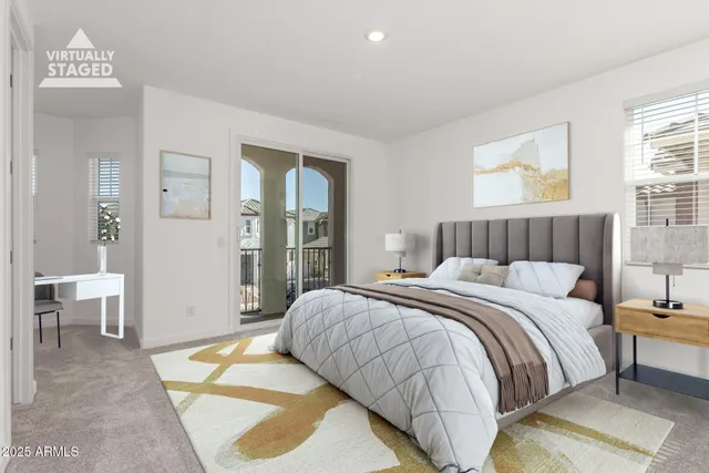 a bedroom with a bed and a couch