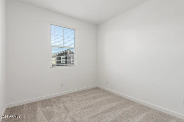 a view of empty room with a window