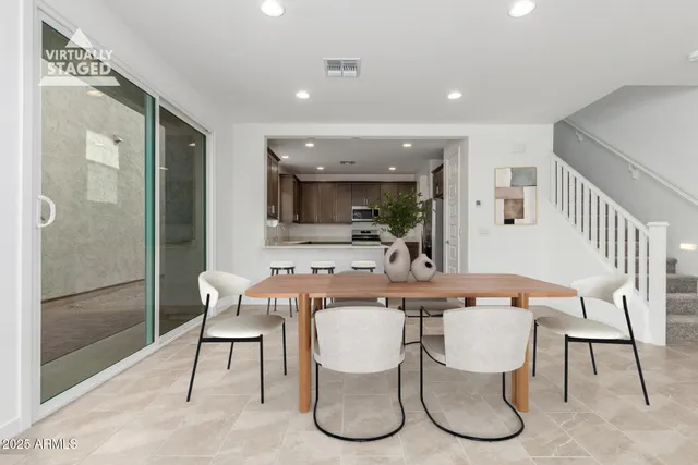 a view of a dining room with furniture