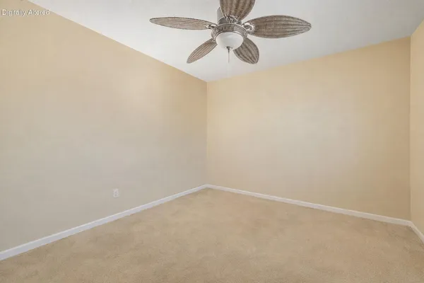 a view of a small space with wooden floor