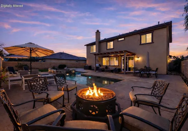 a view of a swimming pool with a patio