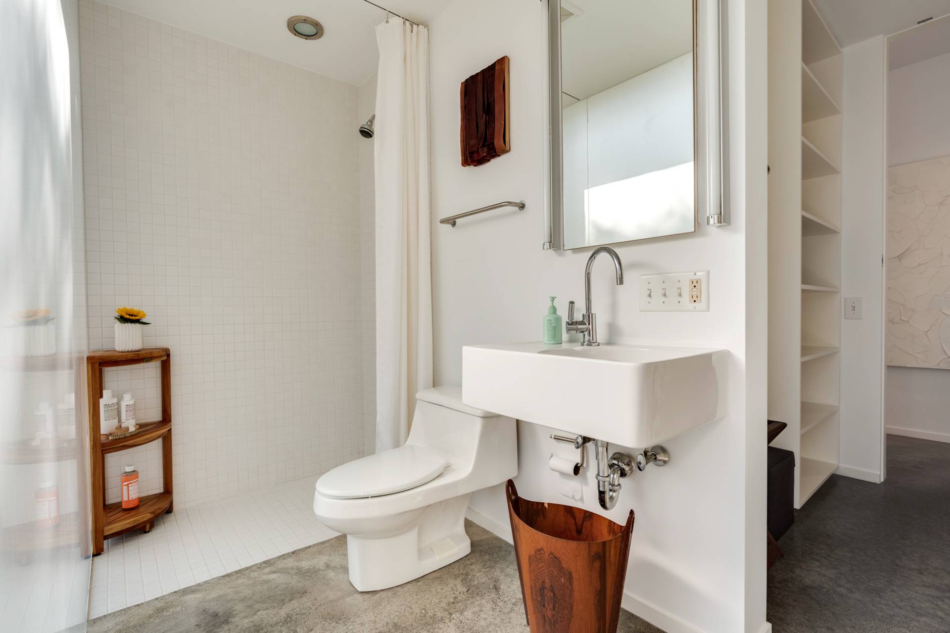 986 & 988 Noyac Path Water Mill, NY 11976 - Photo 14 of 33 a bathroom with a toilet sink and mirror