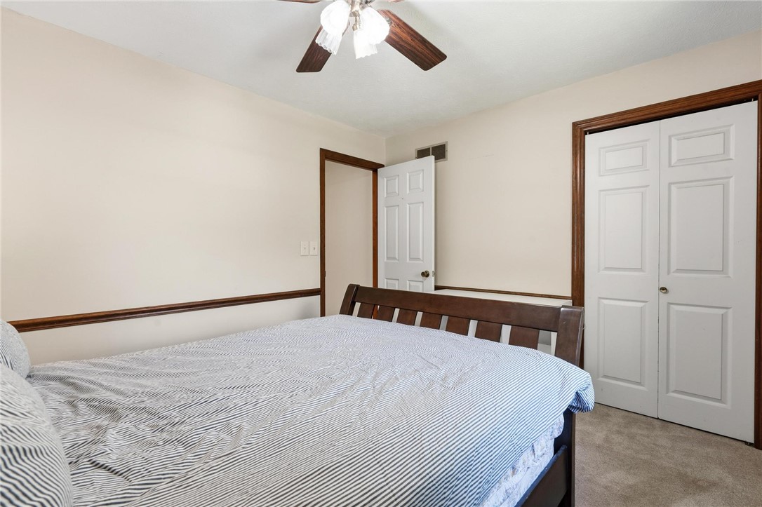 10168 Atchison Road Dayton, OH 45458 - Photo 41 of 44 This cozy bedroom features warm tones and ample storage, creating a comfortable and functional space.