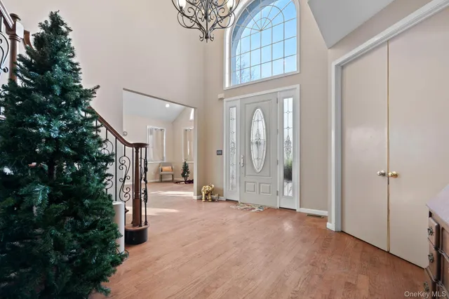a view of livingroom with hardwood floor and hallway