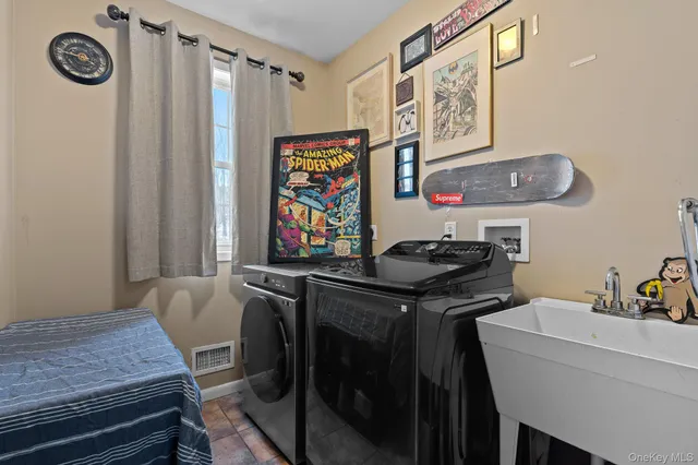 a view of a dining area with furniture and a chandelier