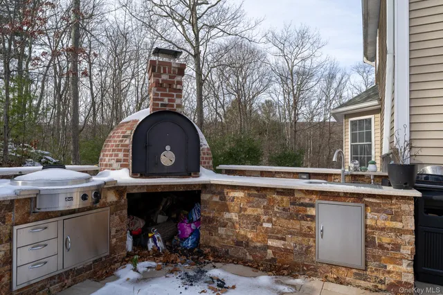 a view of a tables and chairs in a patio