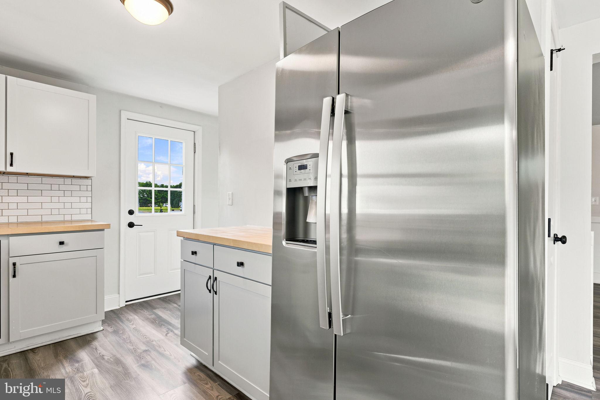 306 Fegan Road Bunker Hill, WV 25413 - Photo 34 of 54 Modern kitchen with sleek appliances.