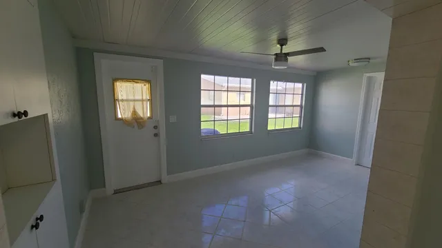 a room with furniture and window