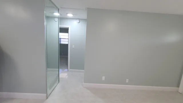 an empty room with an entryway