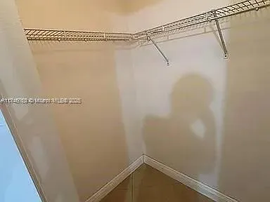 an aerial view of a house with a outdoor space