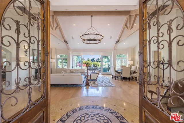 a kitchen with granite countertop a sink and cabinets