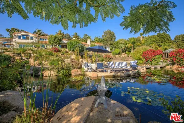 a view of a balcony with lake view