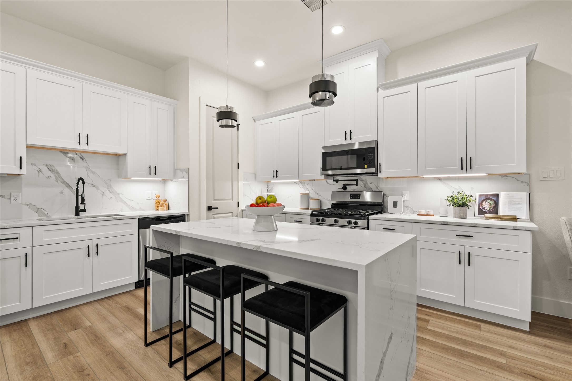 3539 Mainer Street, Unit B Houston, TX 77021 - Photo 5 of 29 Full kitchen layout — clean cabinetry, quartz surfaces, and room on all sides
