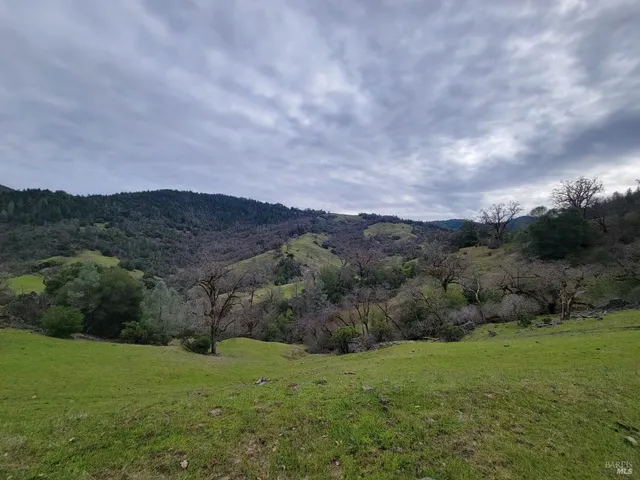 a view of an outdoor space with mountain view