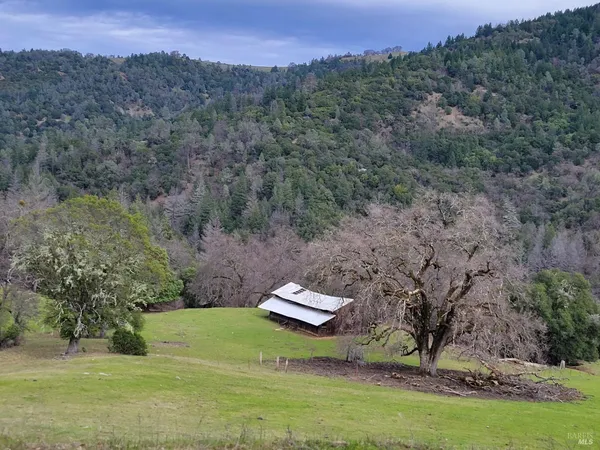 a aerial view of a house with a yard