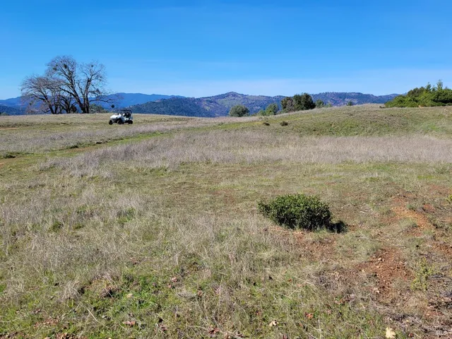 a view of lake with mountain