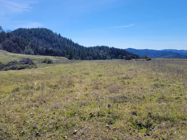 a view of lake and mountain